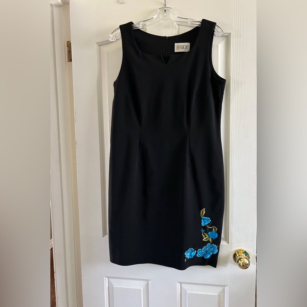 Little black dress with beautiful turquoise embroidery flowers